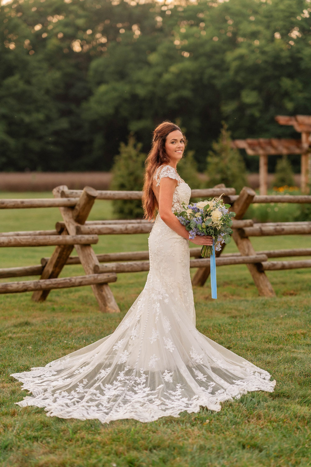 Elegant photo of bride at the meadow