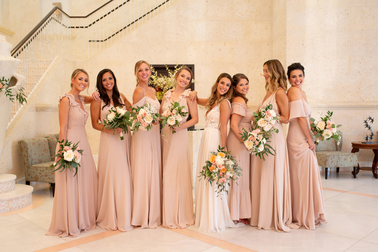 Bride and bridesmaids posing at Atlantis Banquet and Events