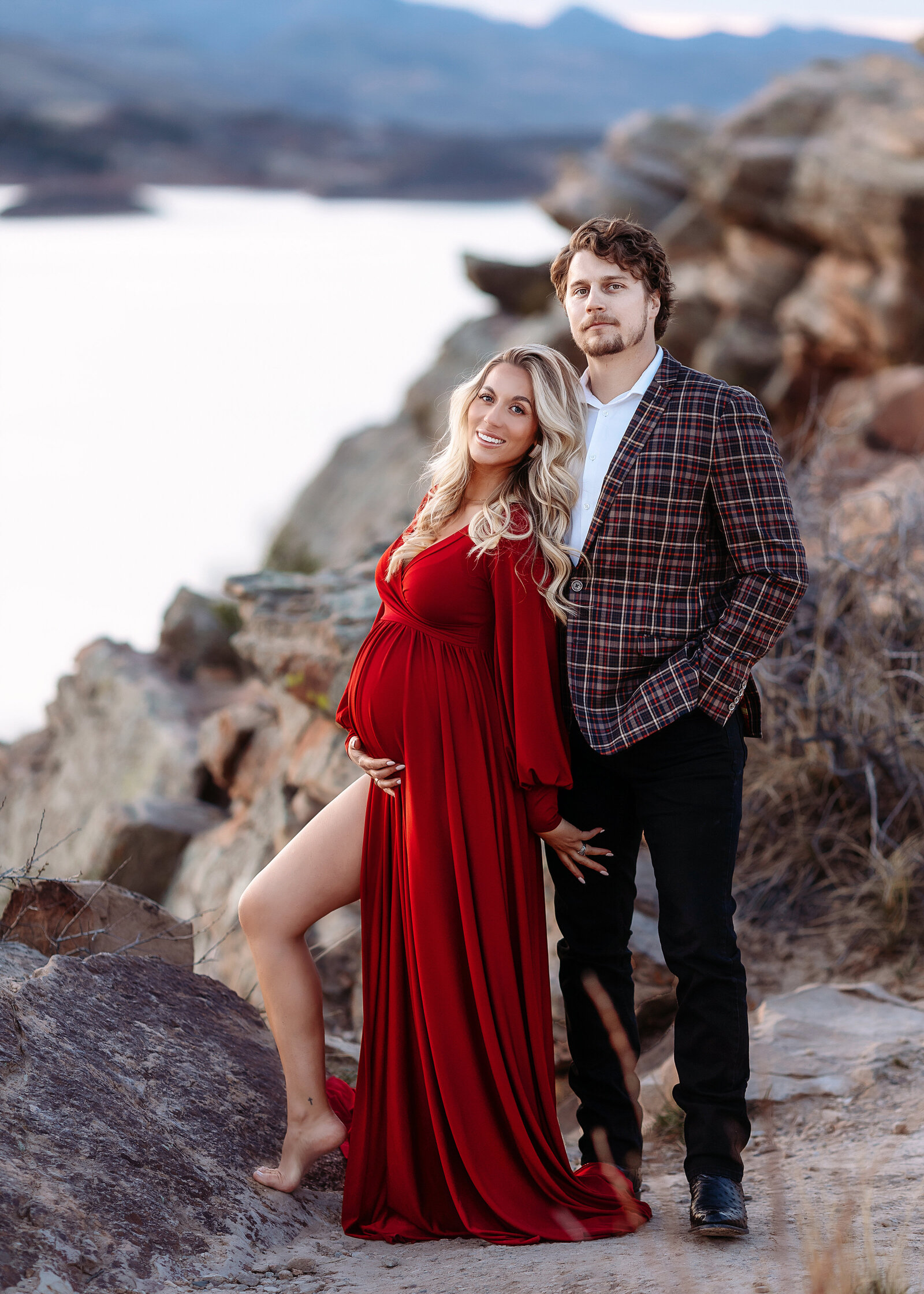 model couple at horsetooth for pregnancy photos