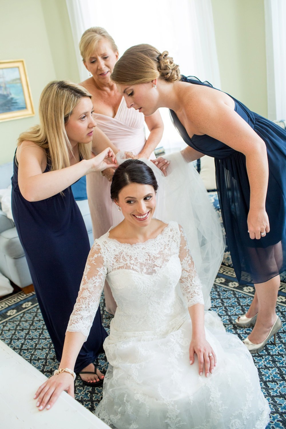 Classic bride getting ready for wedding at Eisenhower House in Newport, RI