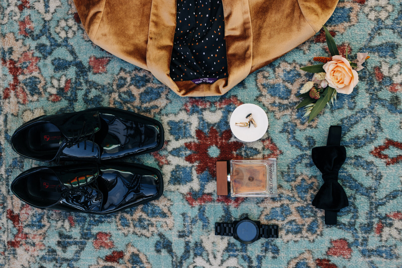 groom details flat lay