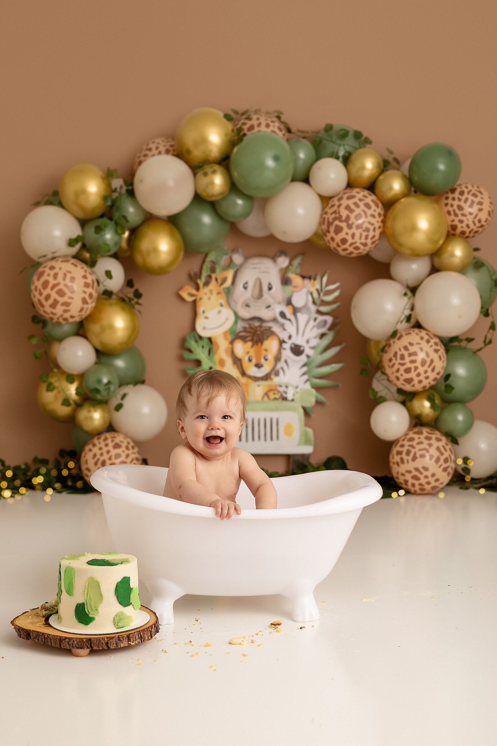 baby in tub at jungle theme cake smash milestone photographer new philadelphia