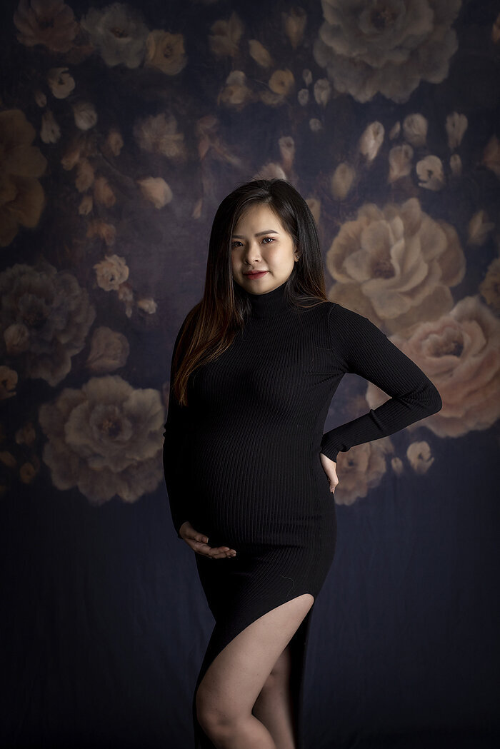 Pregnancy photos in black body suit.