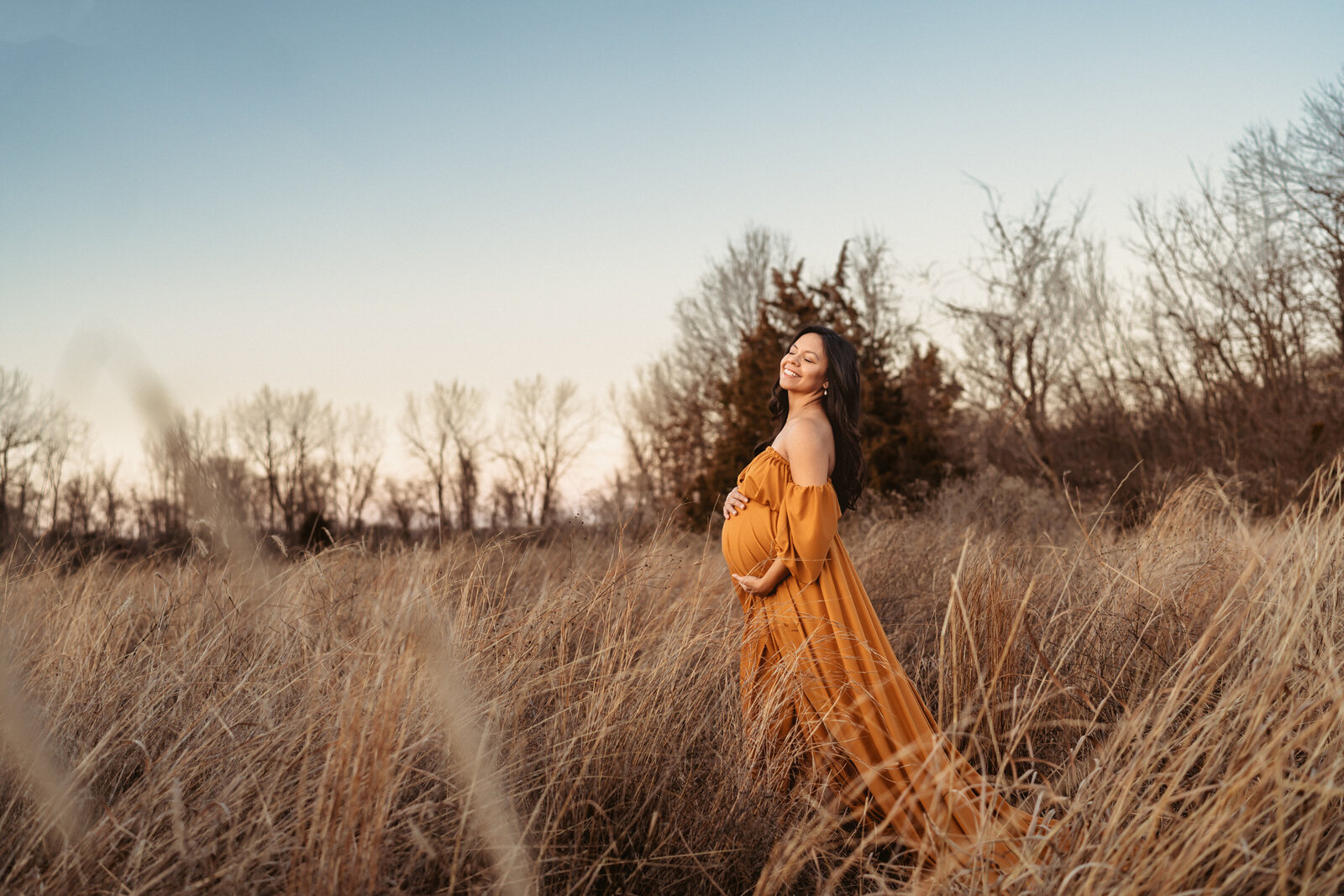 mom standign in a field