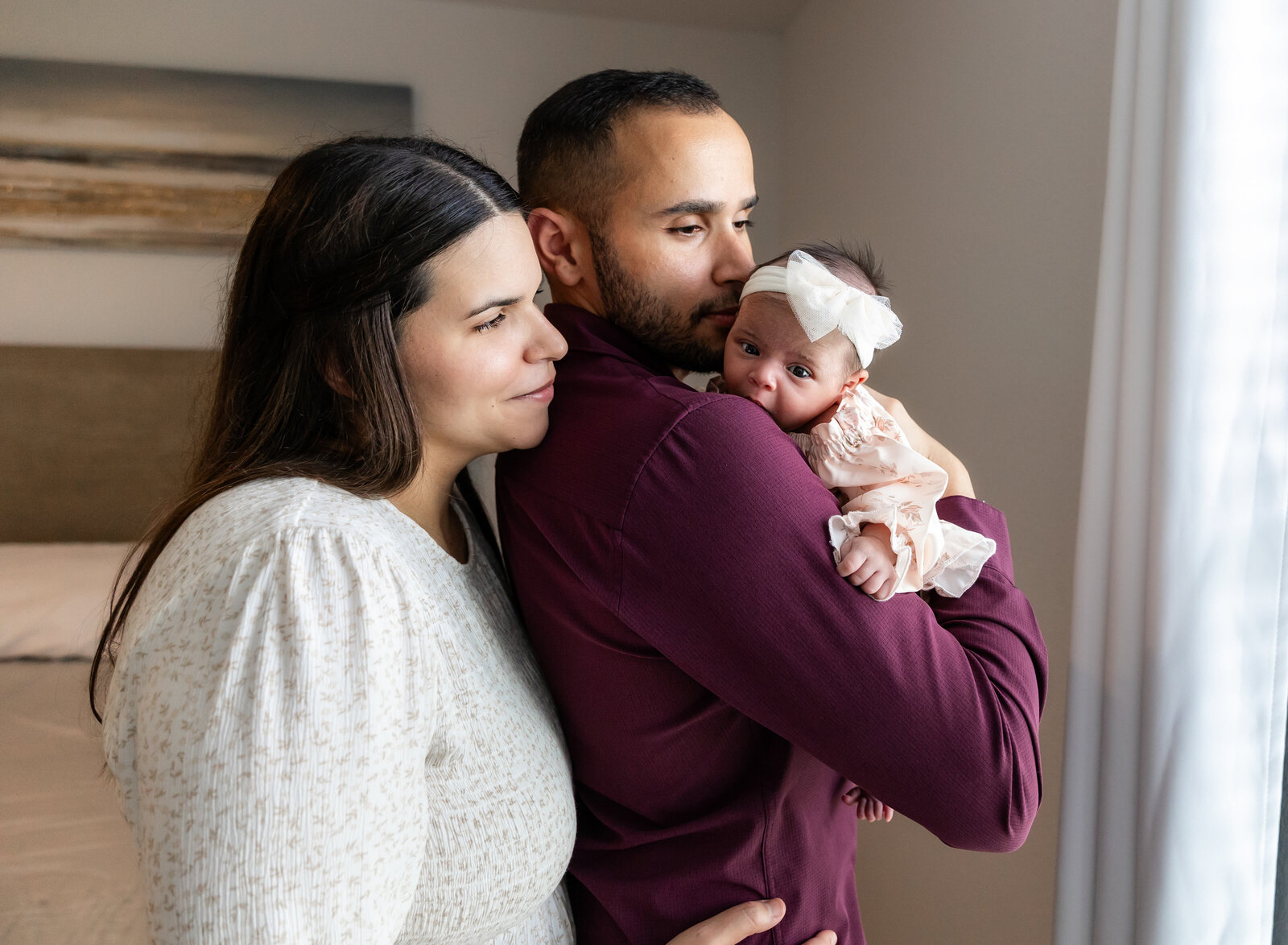 newborn girl with mom and dad