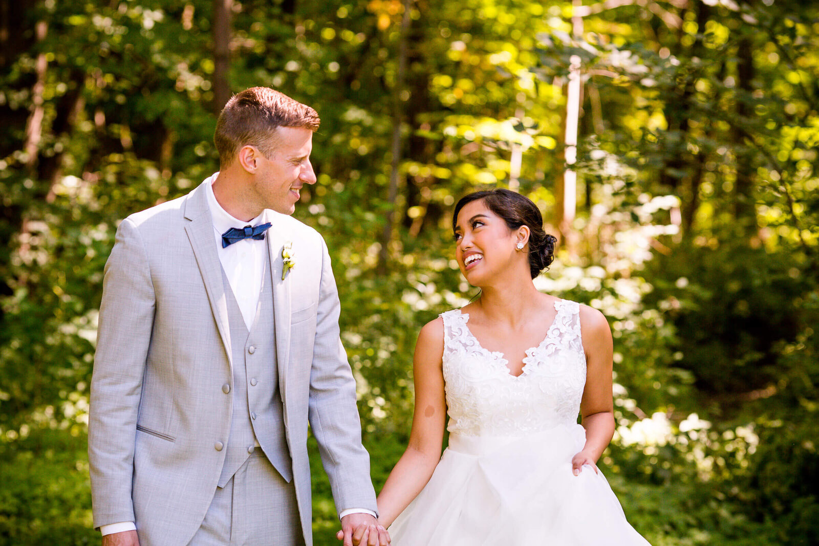 Couple smiling at each other in London Ontario wedding venue