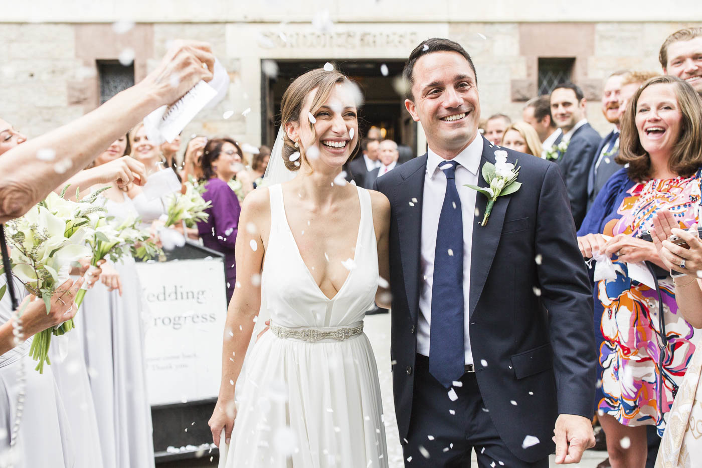 Husband and wife grand exit with flowers