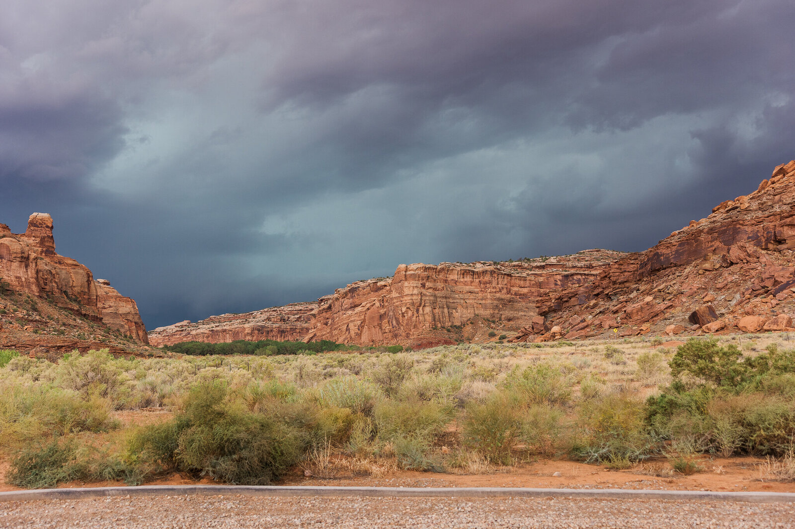 Mountains and storm clouds during a wedding at the Red Earth Venue