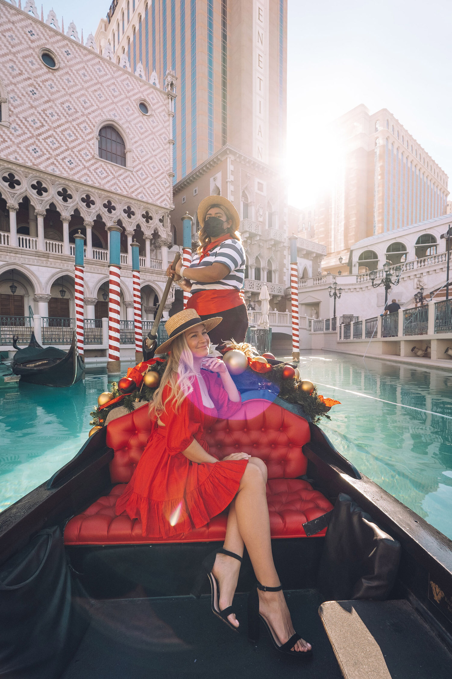 Fashion photography at The Venetian in Las Vegas. Red dress for the holidays fashion photography.