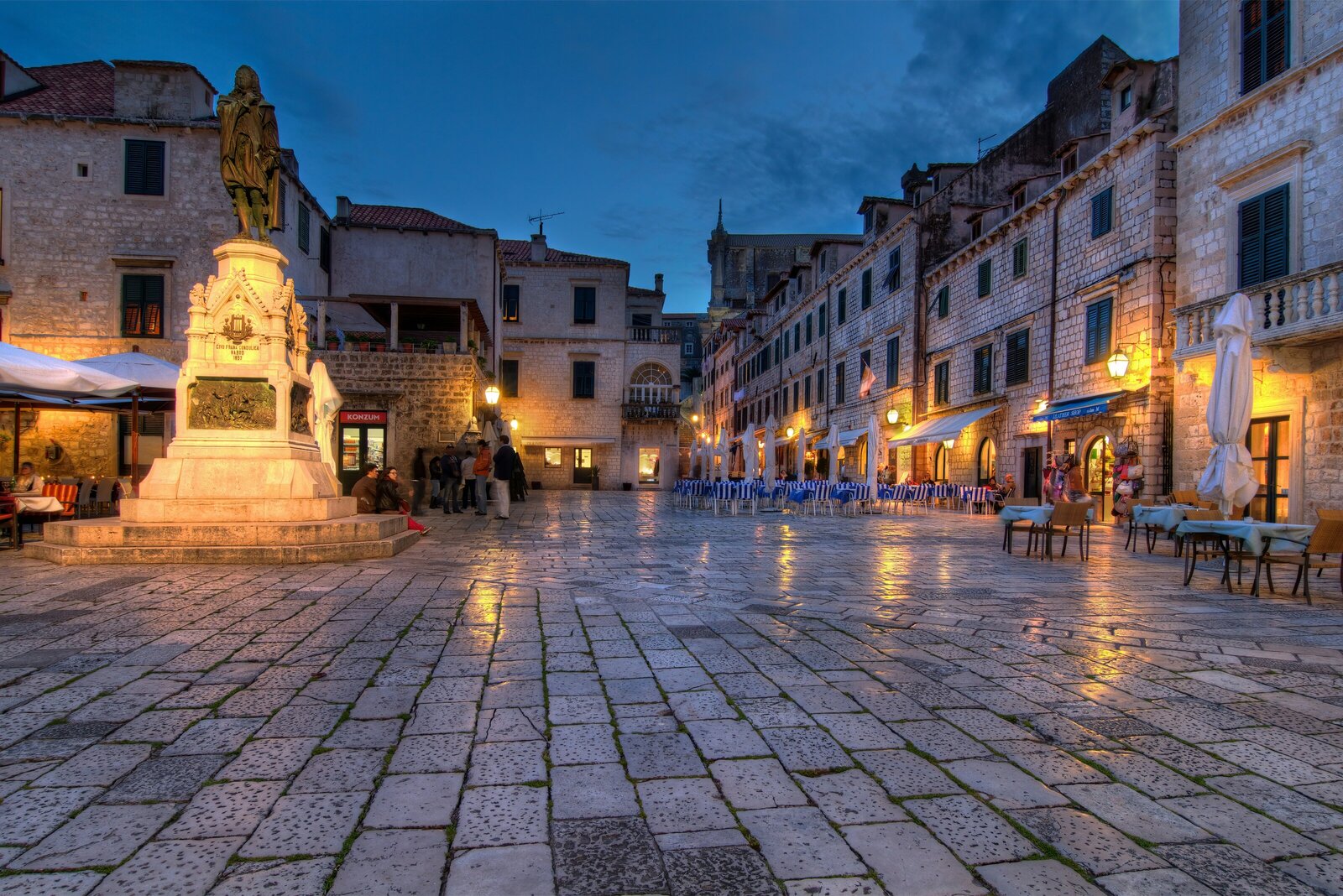 Empty stone street in Dubvrovnik Old Town at night.