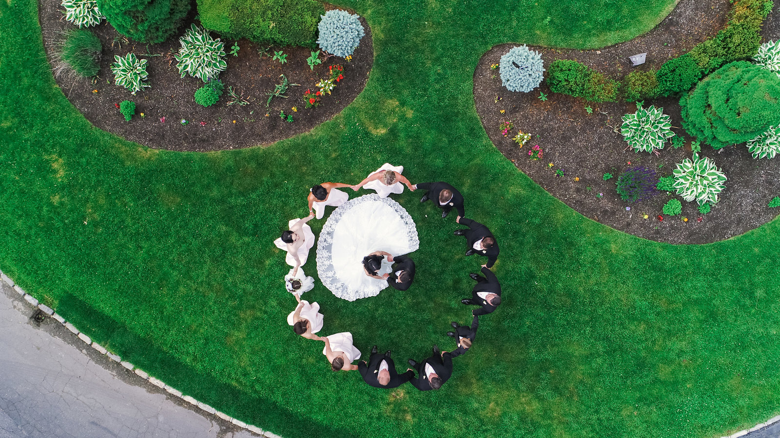 Drone photo of the bridal party at Glen Cove Mansion