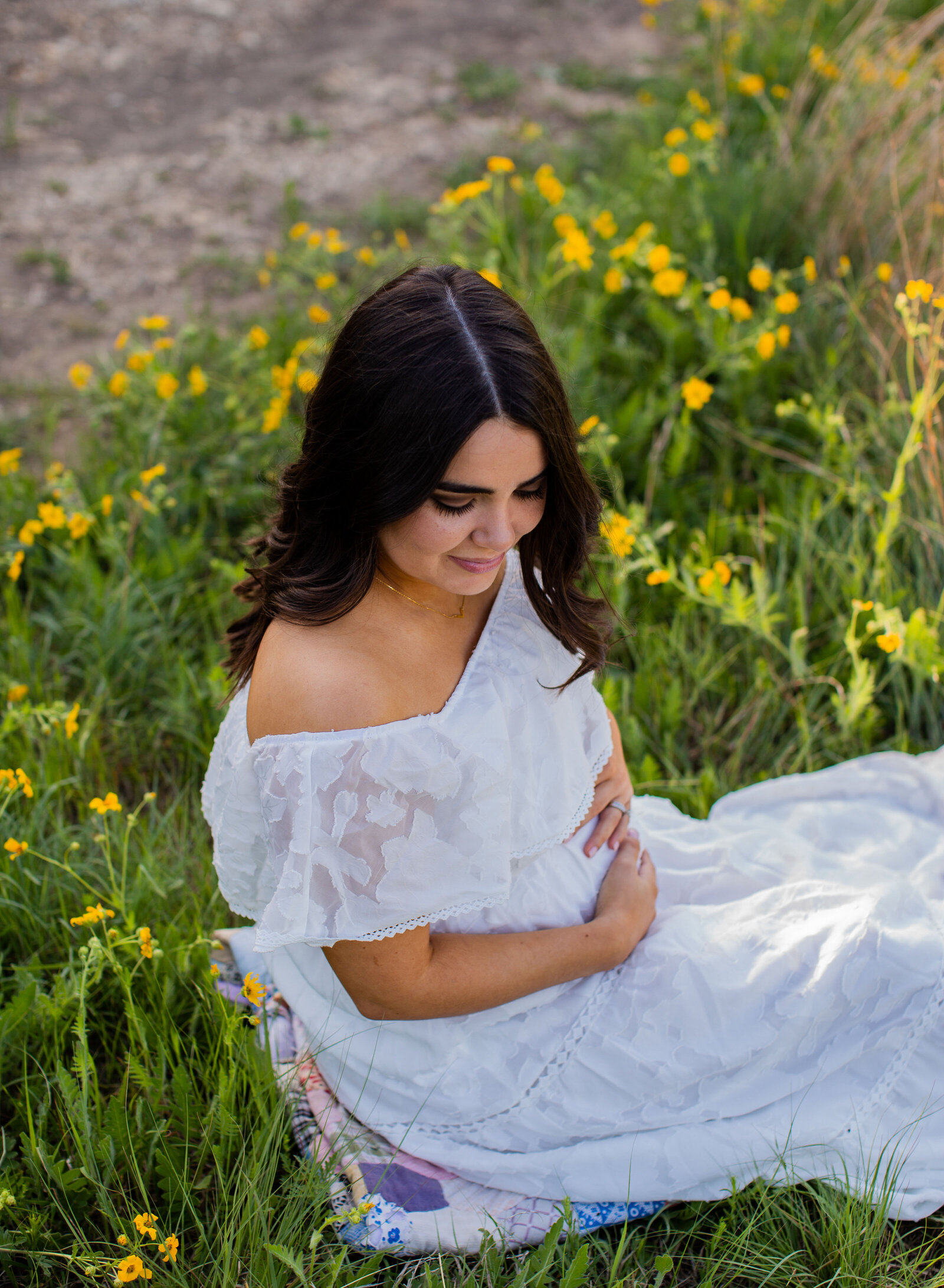 mom to be in white dress