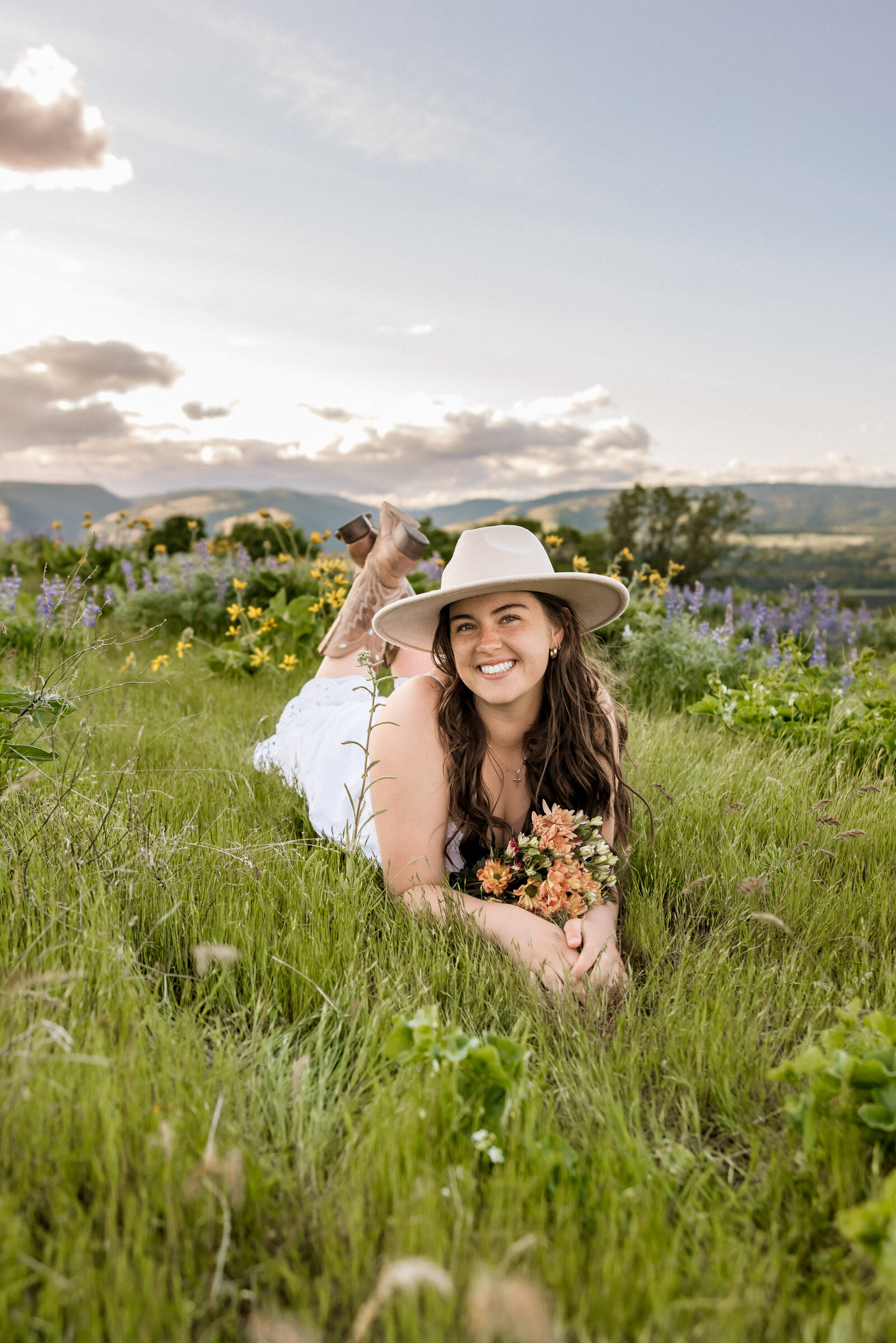 Girl with wildflowers at Tom McCall Viewpoint