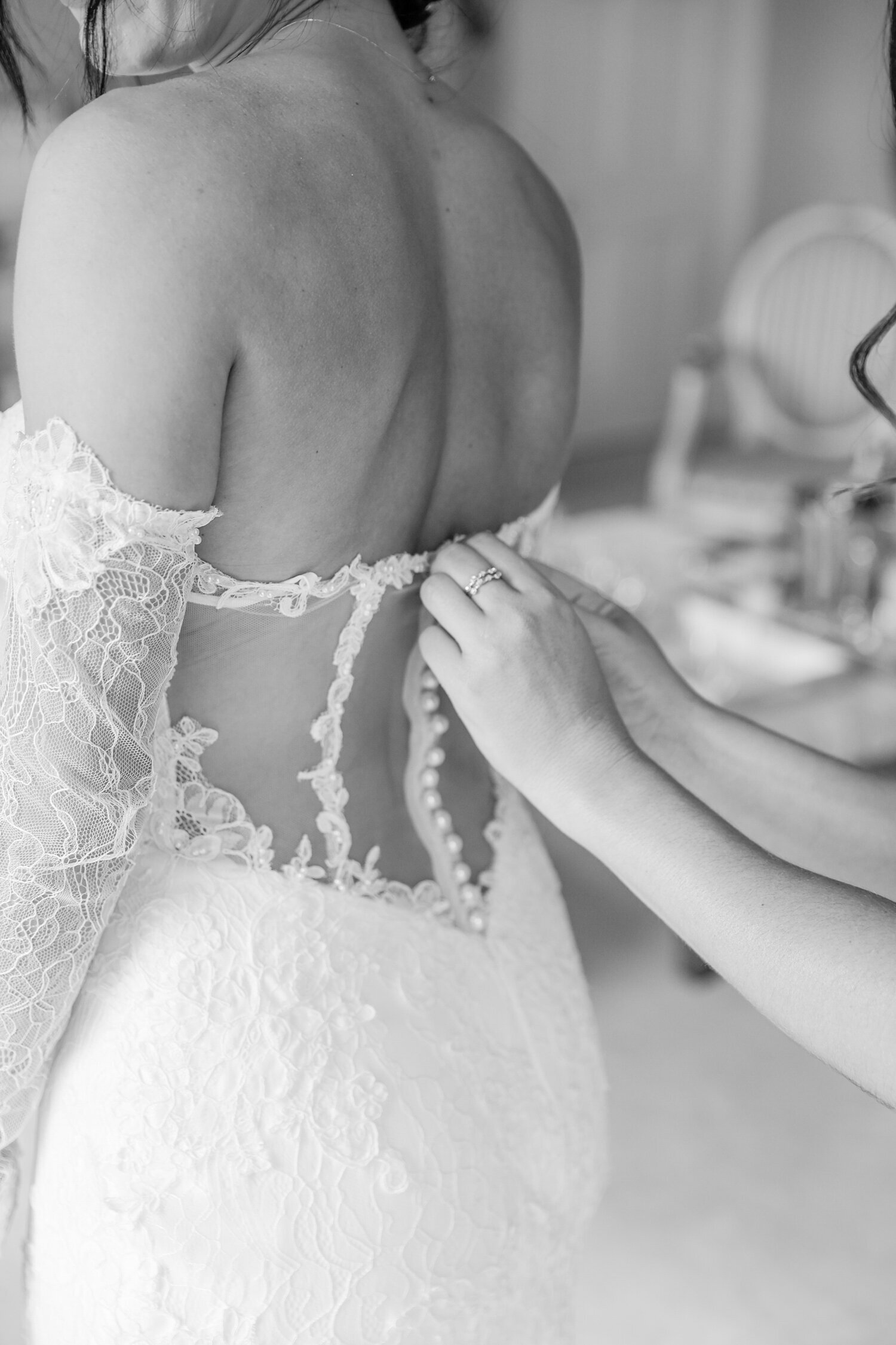 wedding-dress-buttons-being-done-up