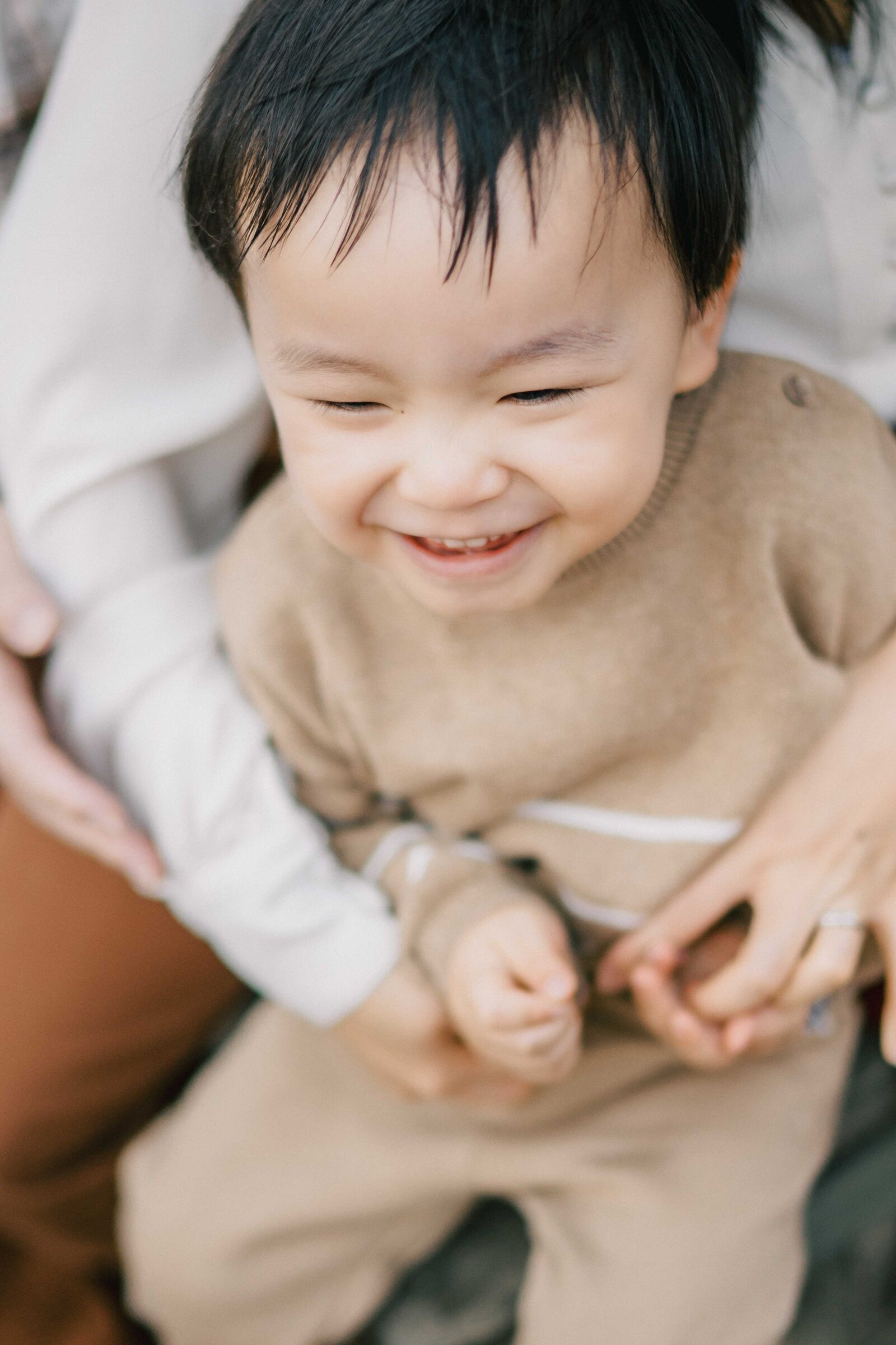 toddler having fun by dc family photographer