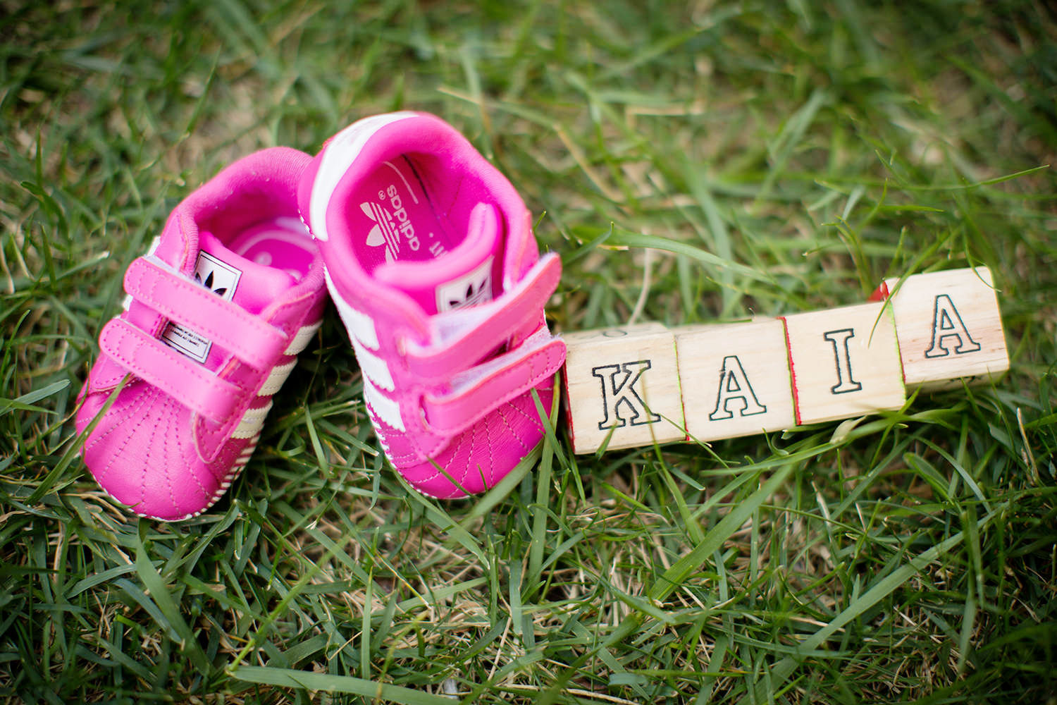 Exquisite baby shoes with baby blocks were used during this Maternity Session.