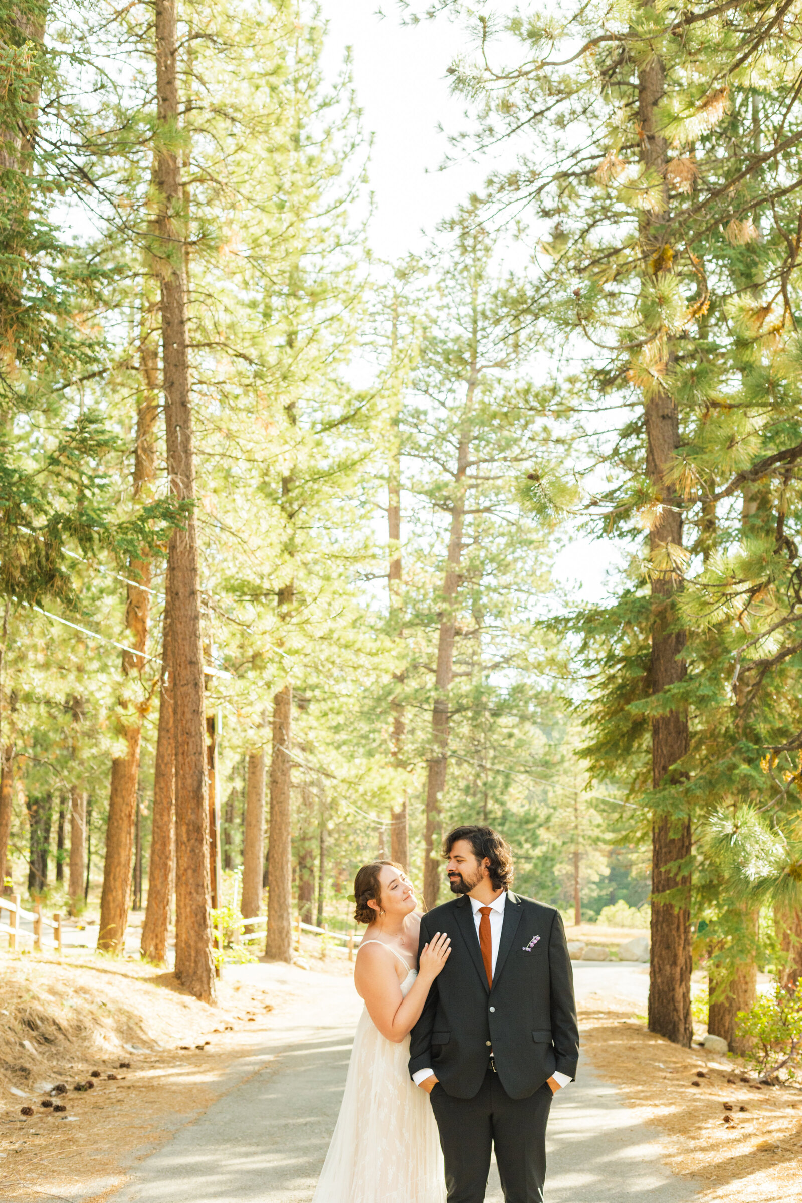 A couple celebrates their intimate elopement at a cabin at Big Bear Lake, California.
