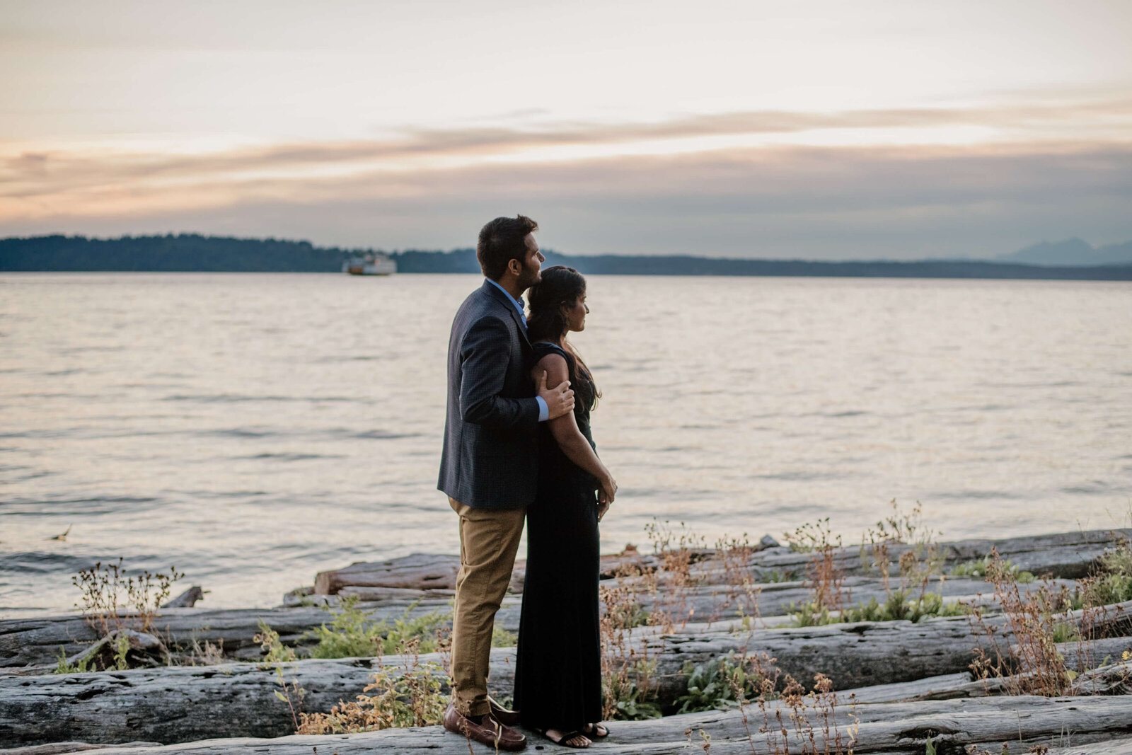 Couple looking out at Puget Sound.