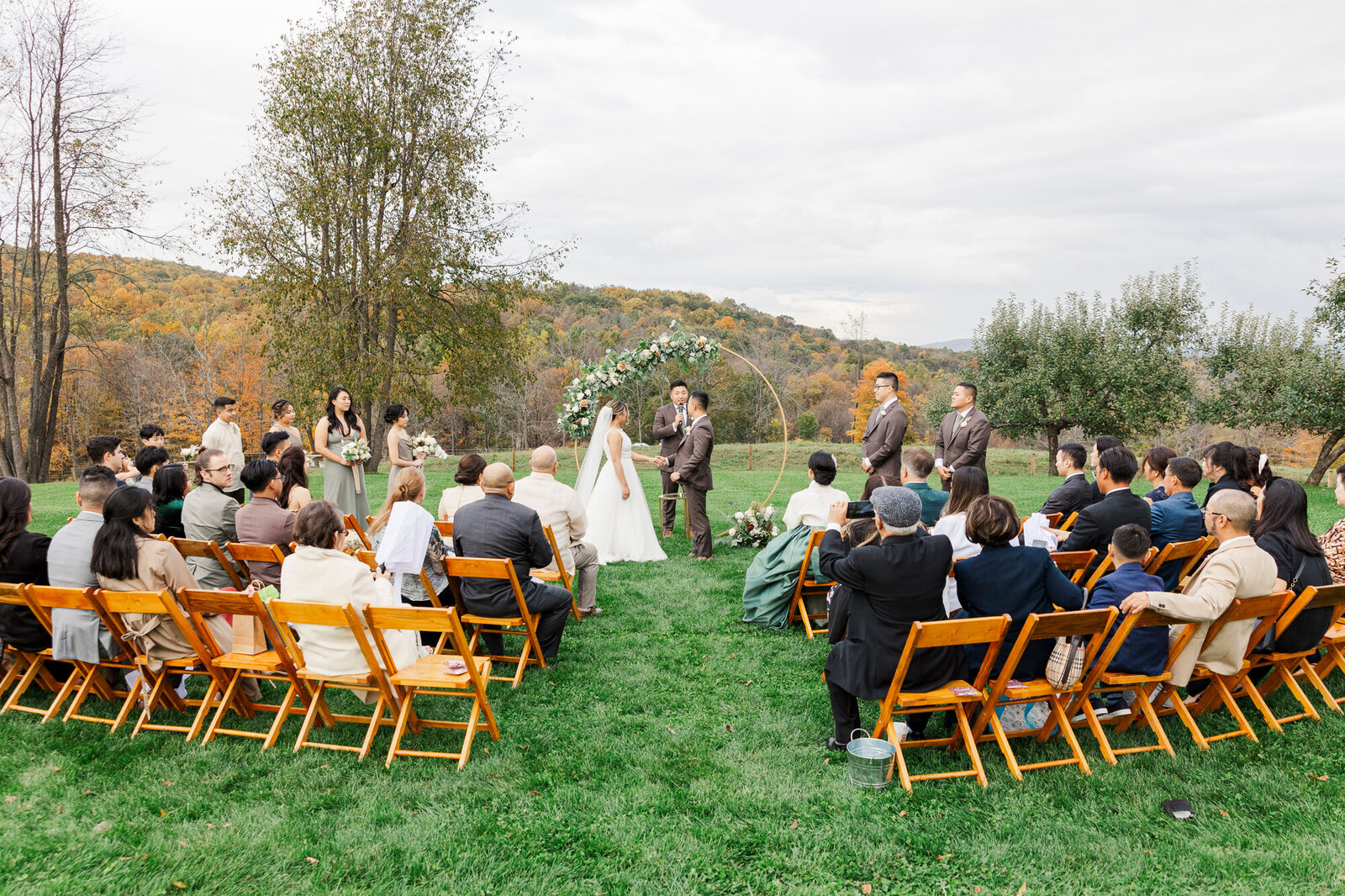 Johannah and Taeyang during their outdoor Hudson Valley wedding ceremony