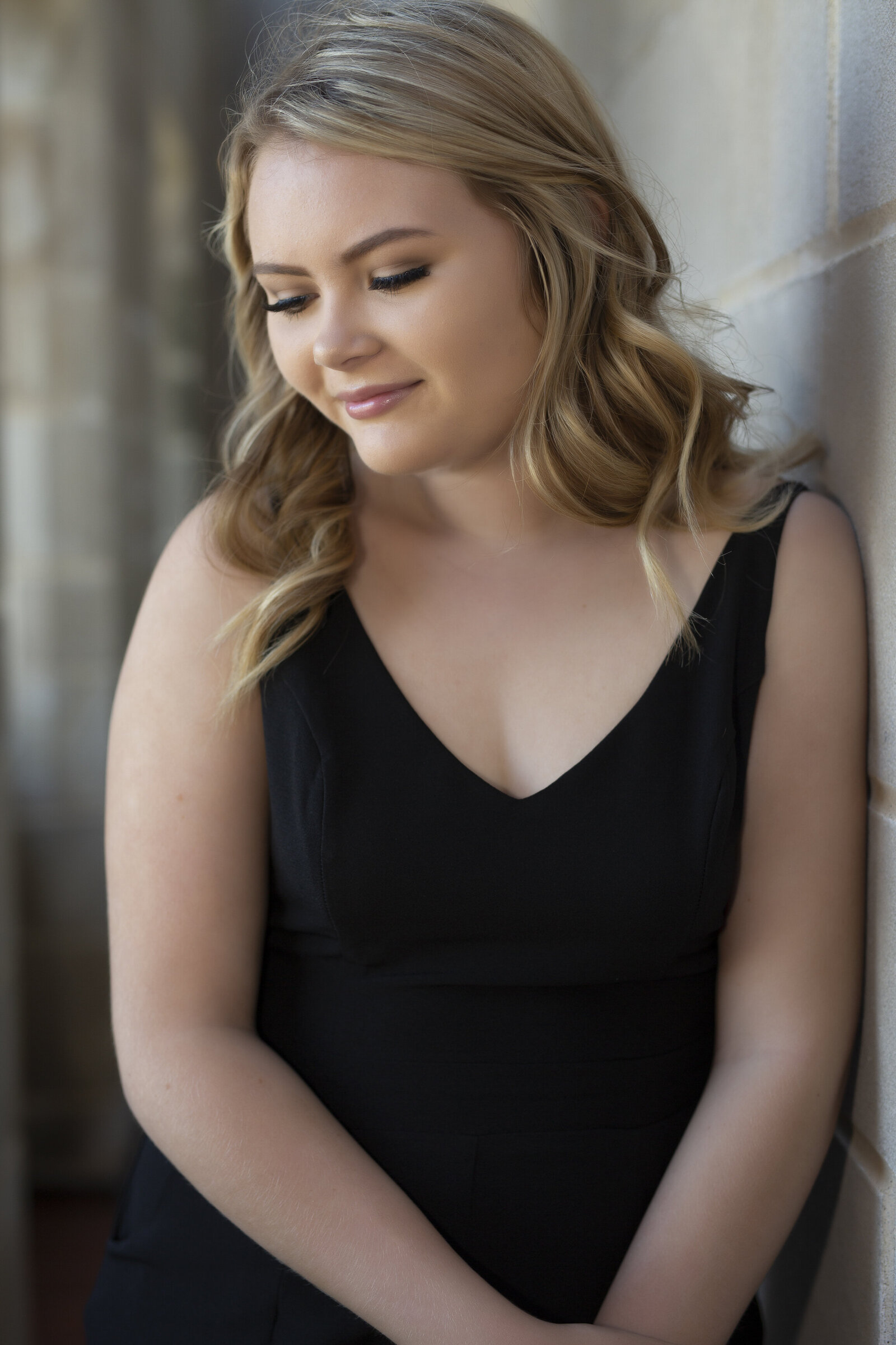 Schuyler poses at the Capitol during a senior photo shoot