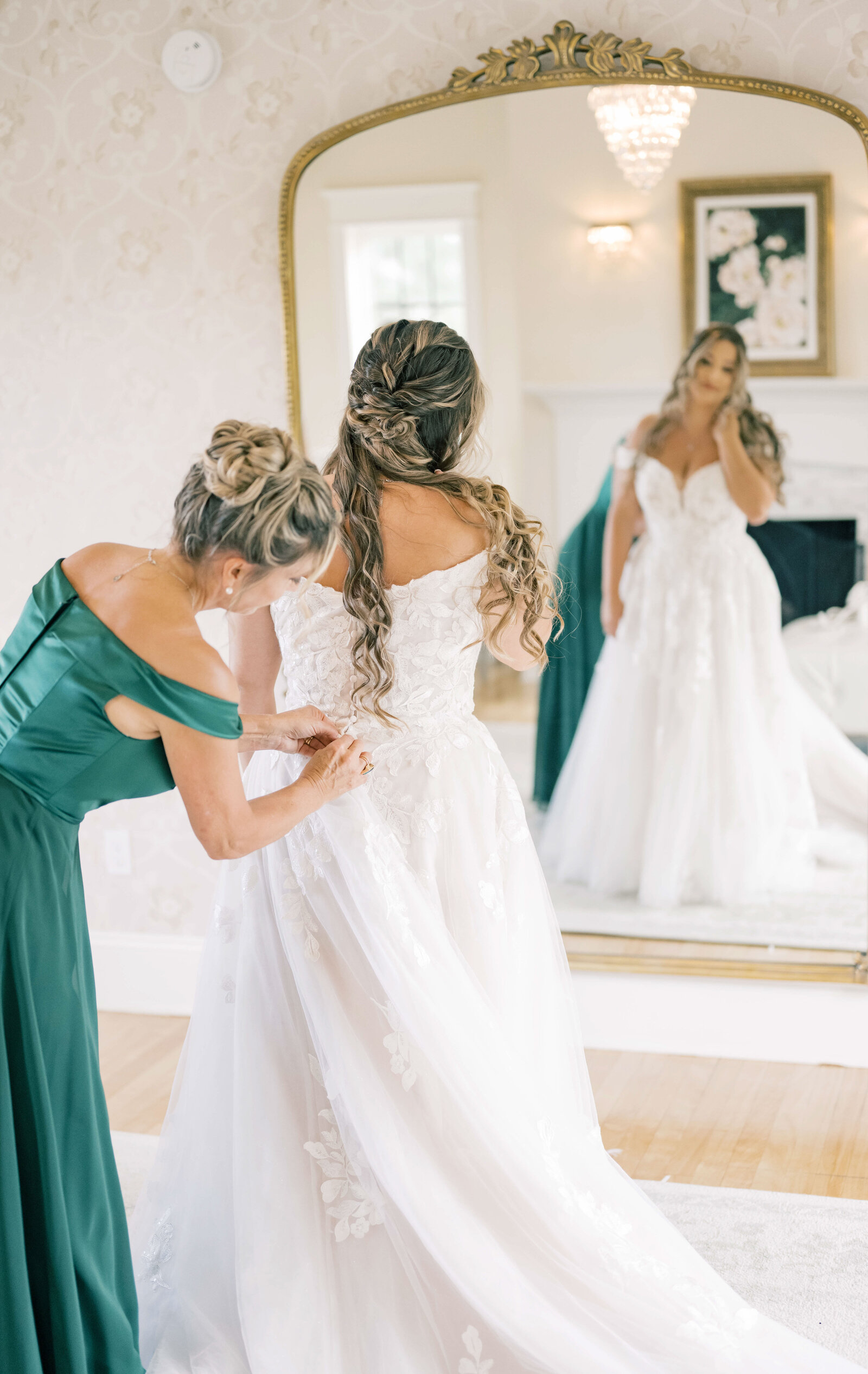 a bride and her Mom getting ready