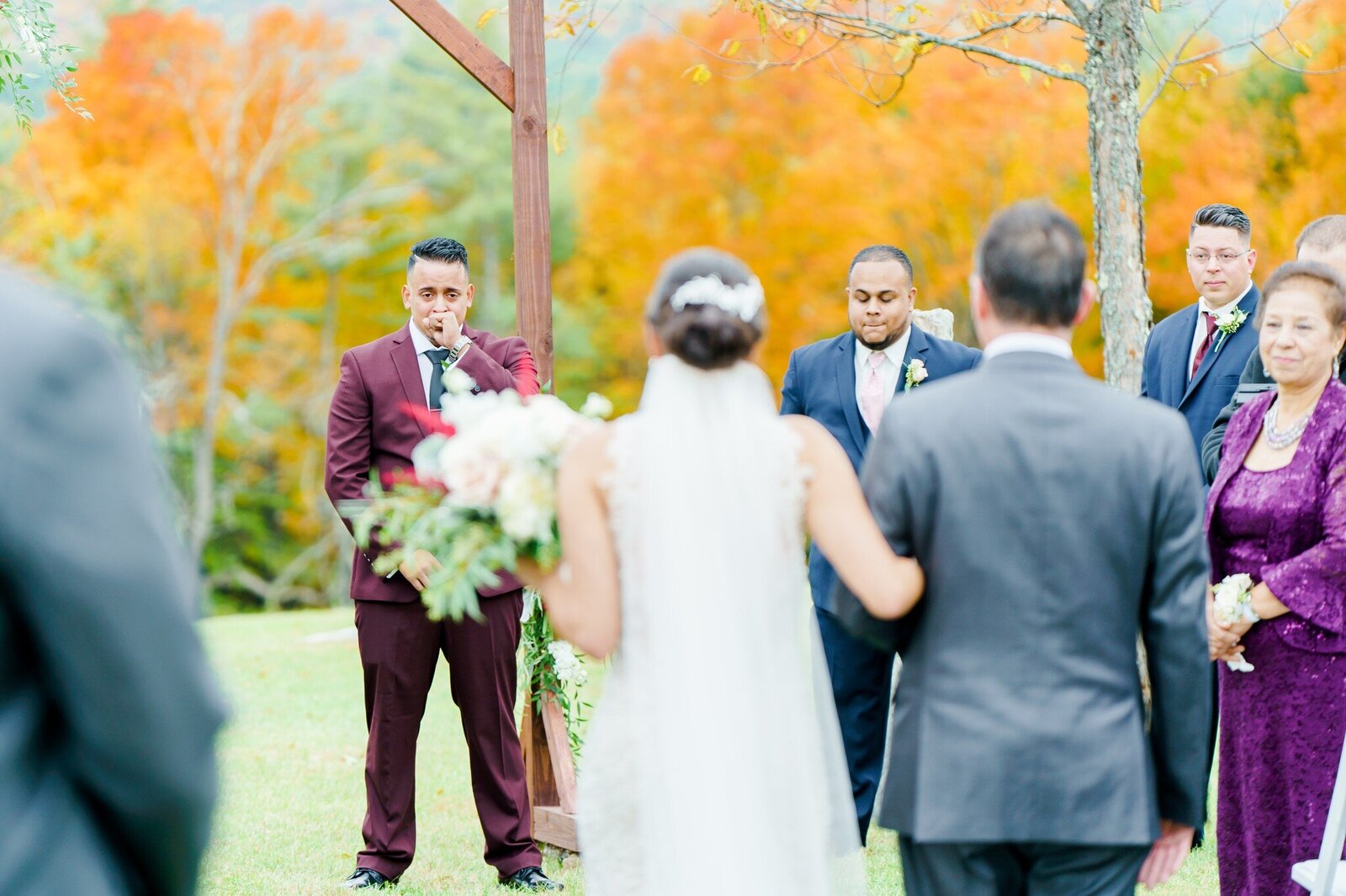 New Hampshire bride walking down the aisle to groom