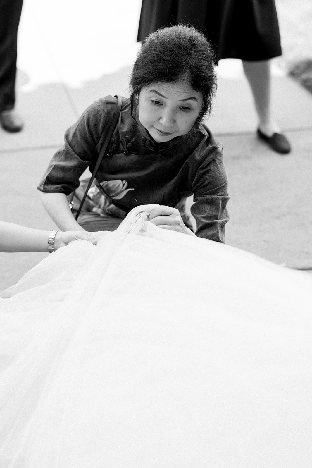 The adorable ring bearer steals the show with his cute expression during the Stanford University wedding ceremony.