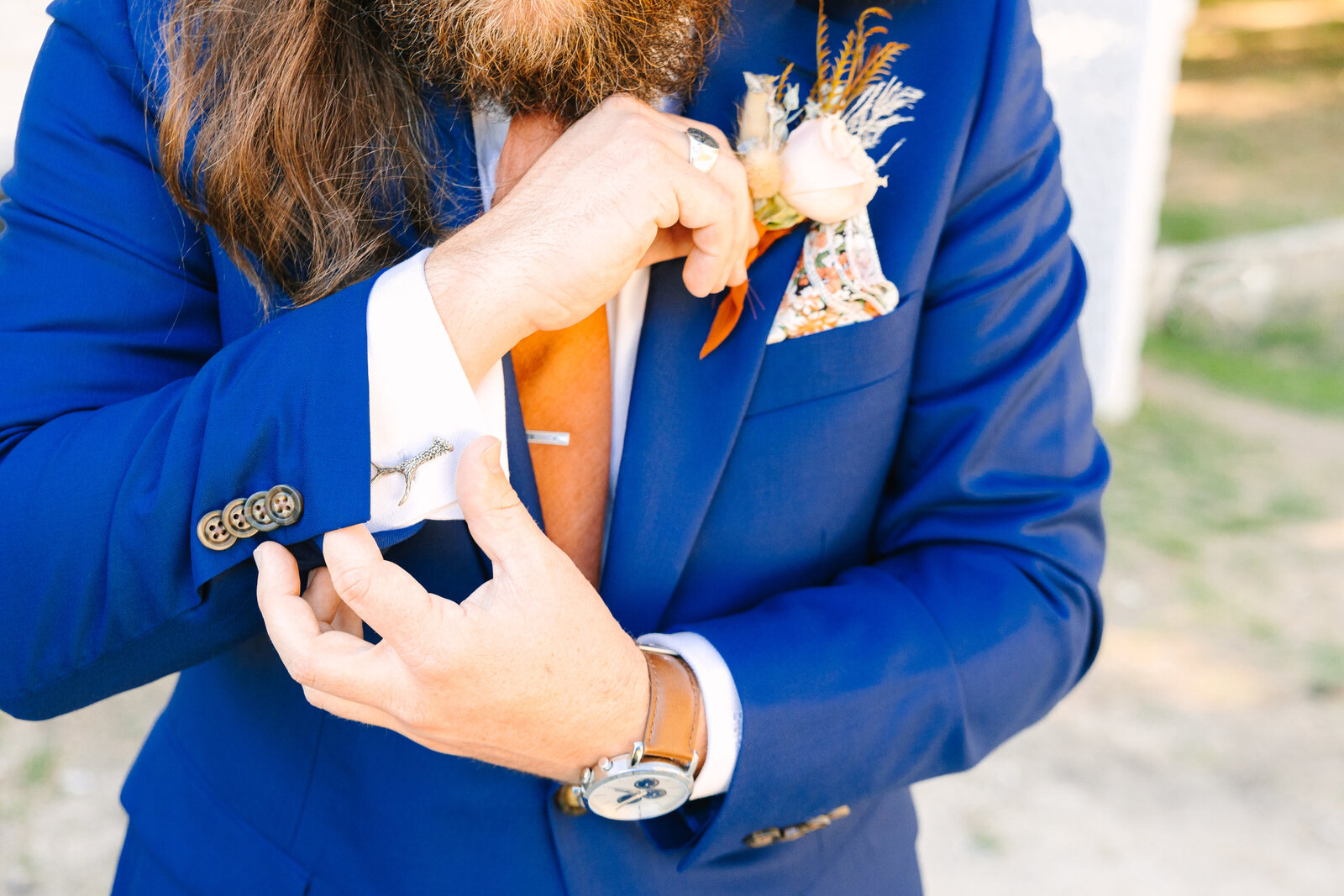 Tattoo bride and groom getting ready for their colorful wedding in Santa Cruz, California.