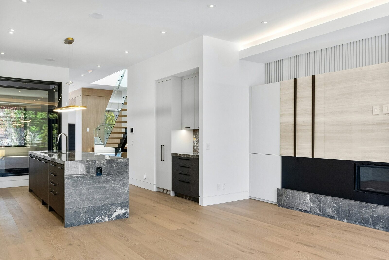kitchen with stone counters and flooring by one of the best home renovation companies in atlanta
