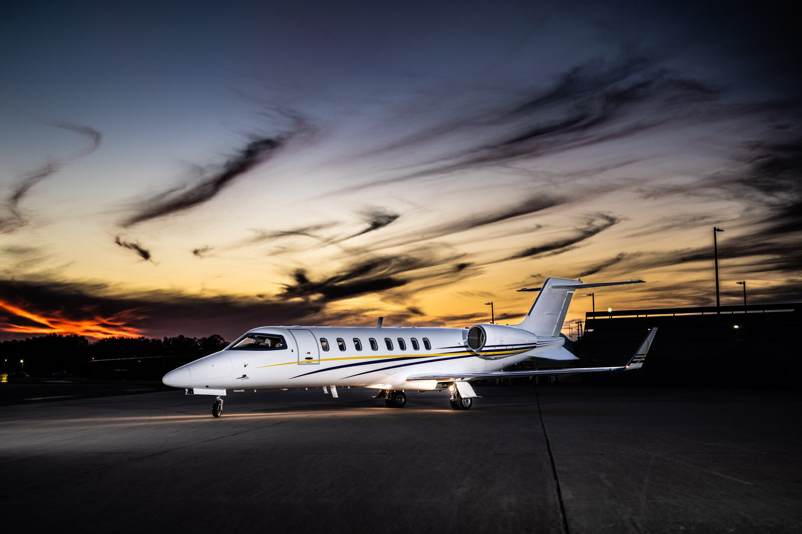 Private jet with dramatic sky