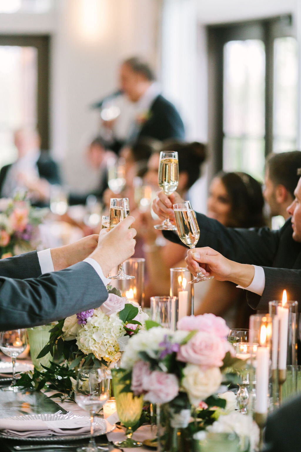 Wedding guests celebrating with champagne