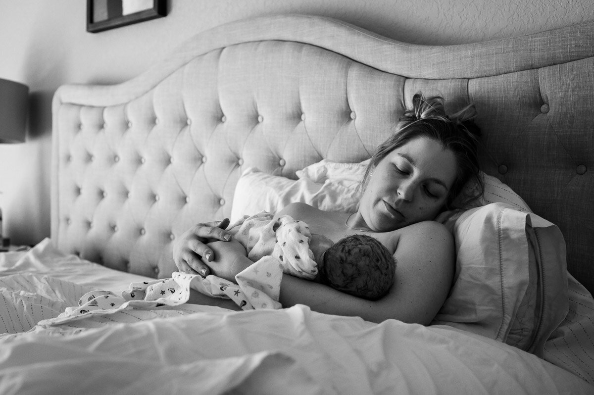 mother breastfeeds baby after homebirth