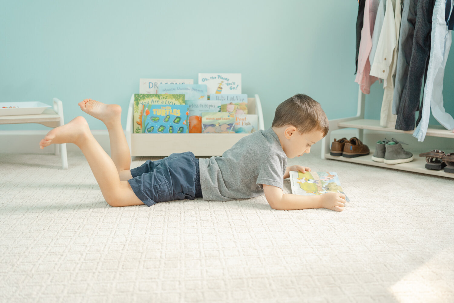 boy reading a book during lifestyle product picture Vienna,VA