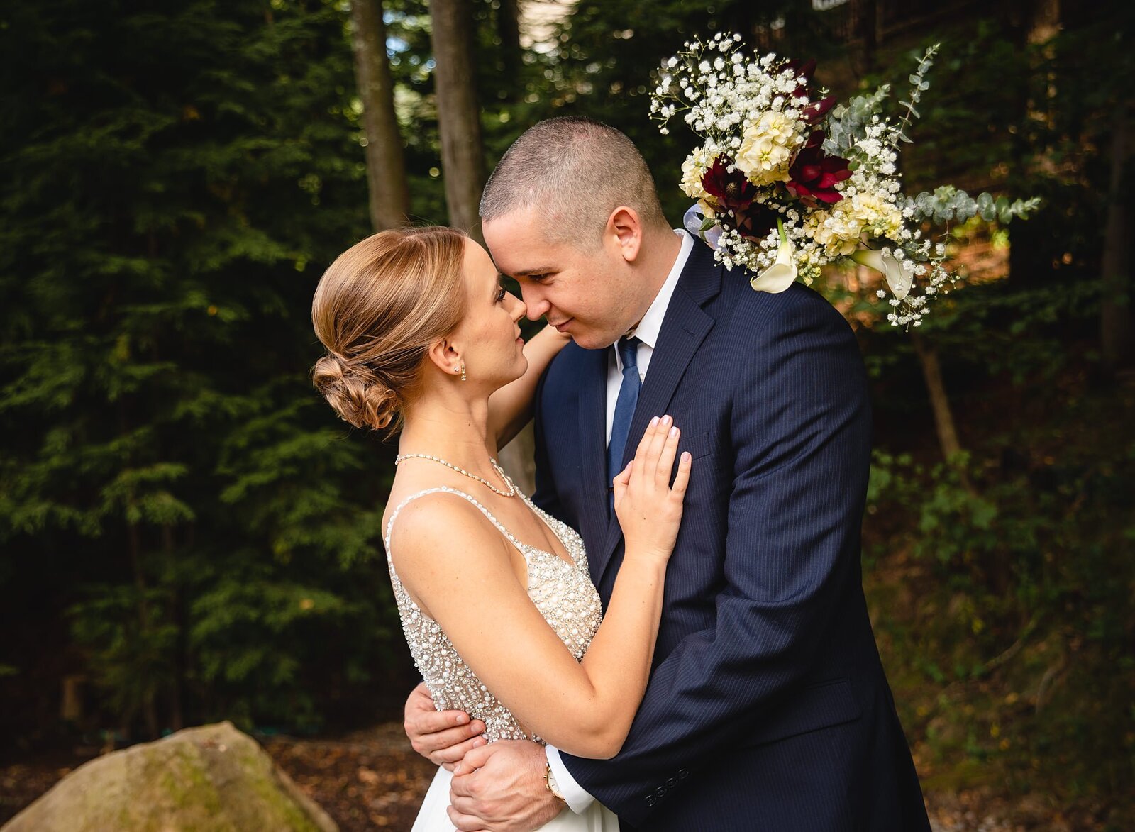 New England elopement couple with foreheads together