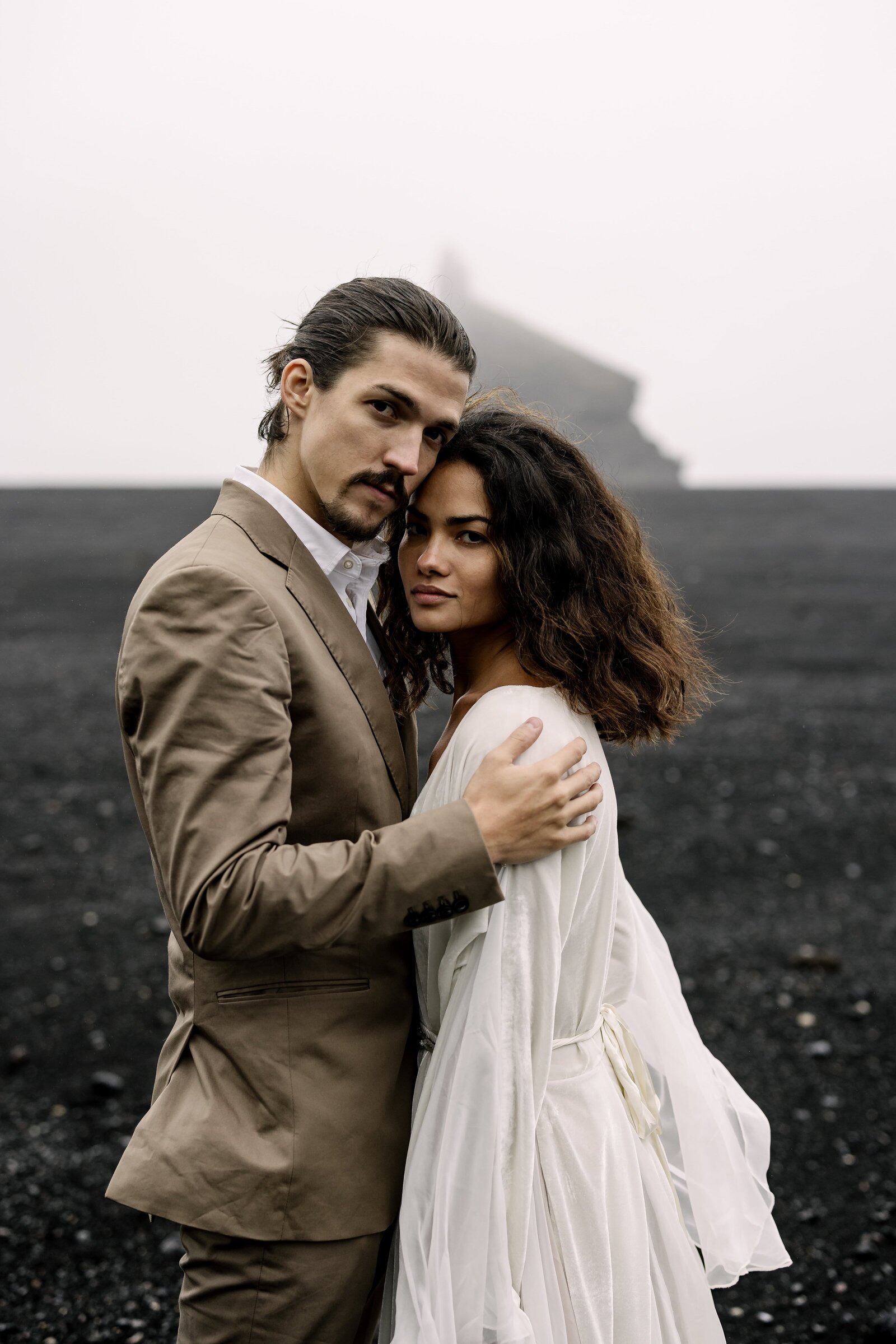 sexy elopement portraits with black landscape in Iceland