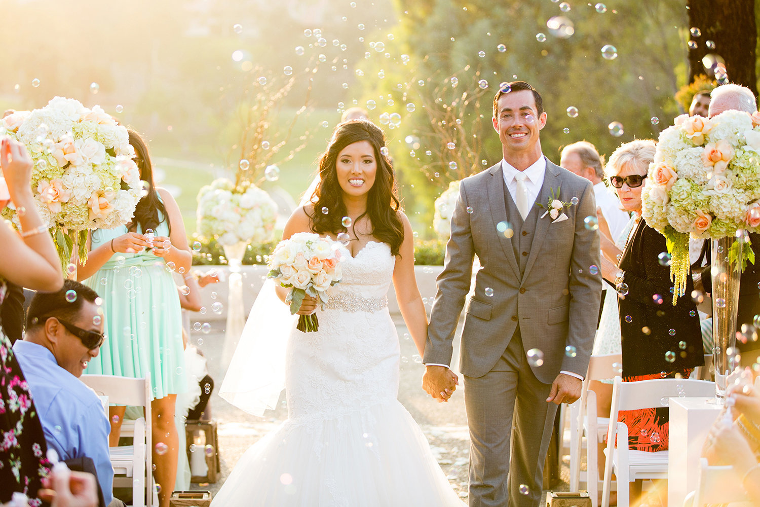 Rancho Bernardo Inn wedding photos ceremony with bubbles blowing