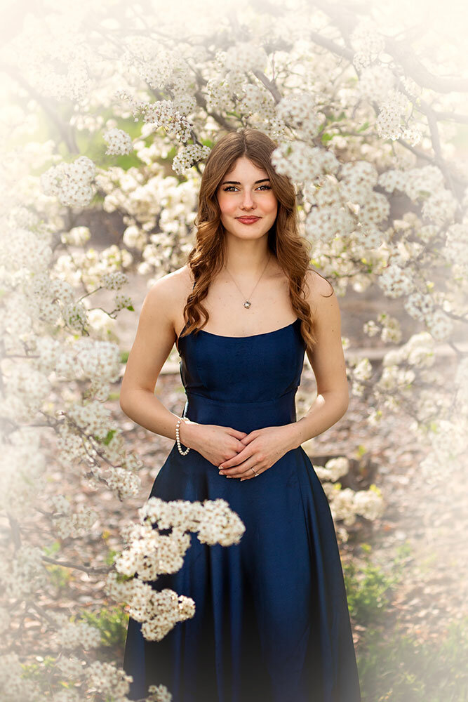 dreamy-fairytale-senior-high-school-portrait-small-colorado-farm-white-creamy-blossom-trees-royal-blue-dress