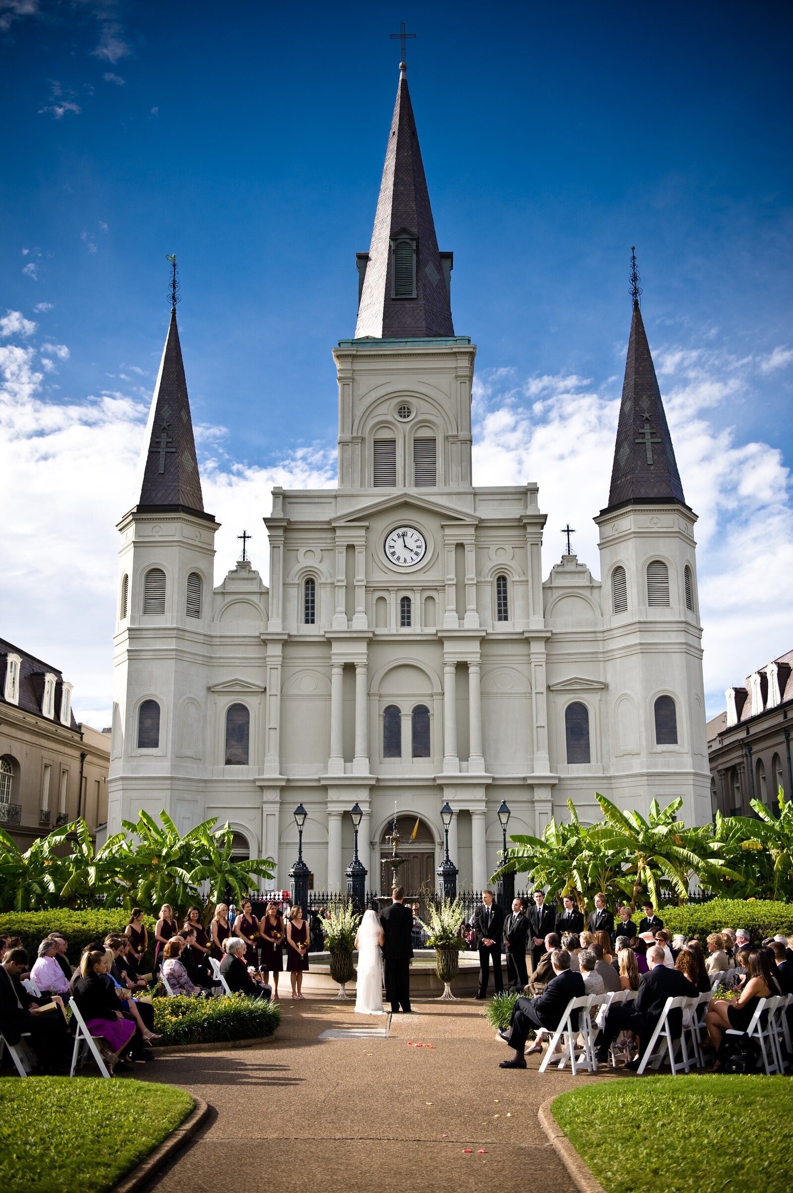 Wedding ceremony in New Orleans Jackson Square with Cathedral in the background