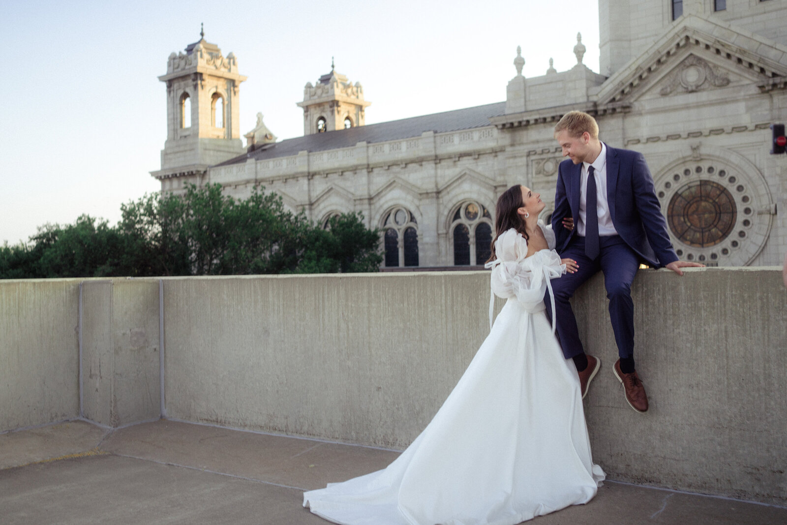stand below cathedral in  New York city wedding