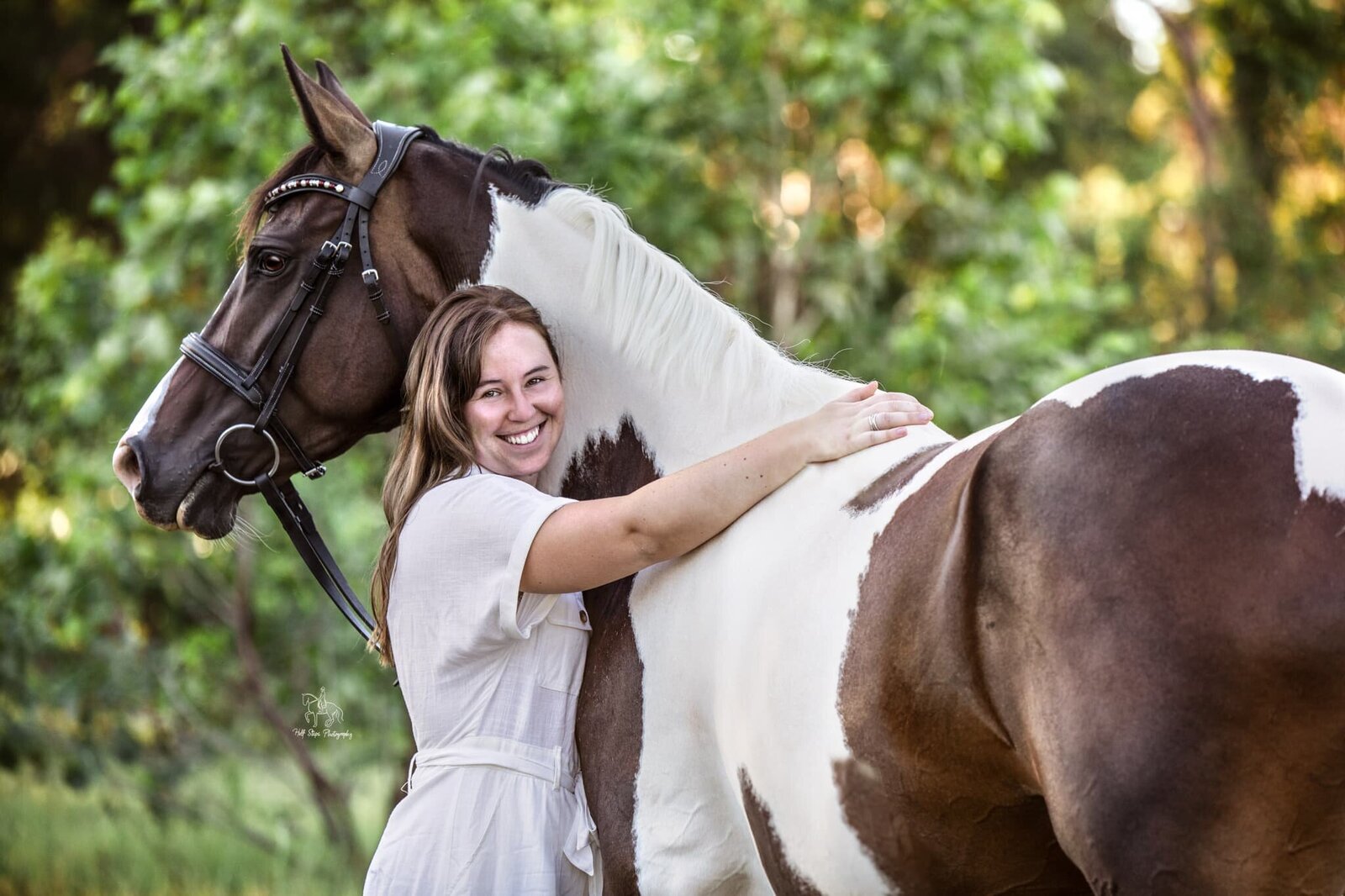 (8). Woman hugs pinto horse Half Steps Photography