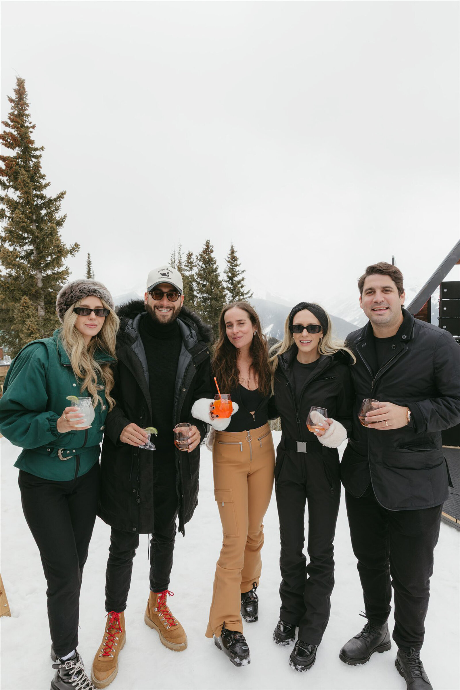 Stylish bride and groom at multi-day Aspen wedding with upscale decor and alpine scenery