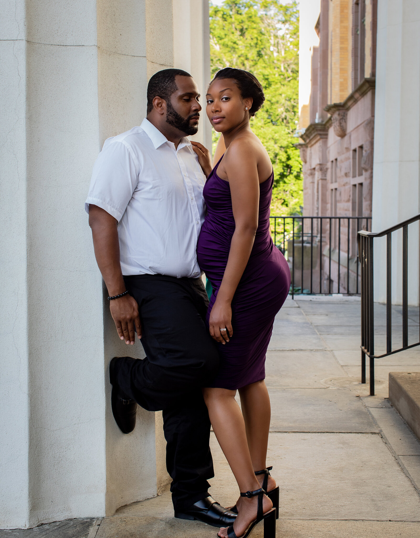 Husband and wife maternity pictures  on russell sage campus downtown troy