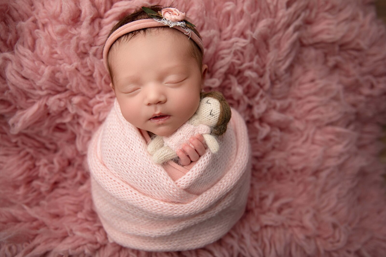 Soft and Serene Newborn Studio Photos of a Baby Girl