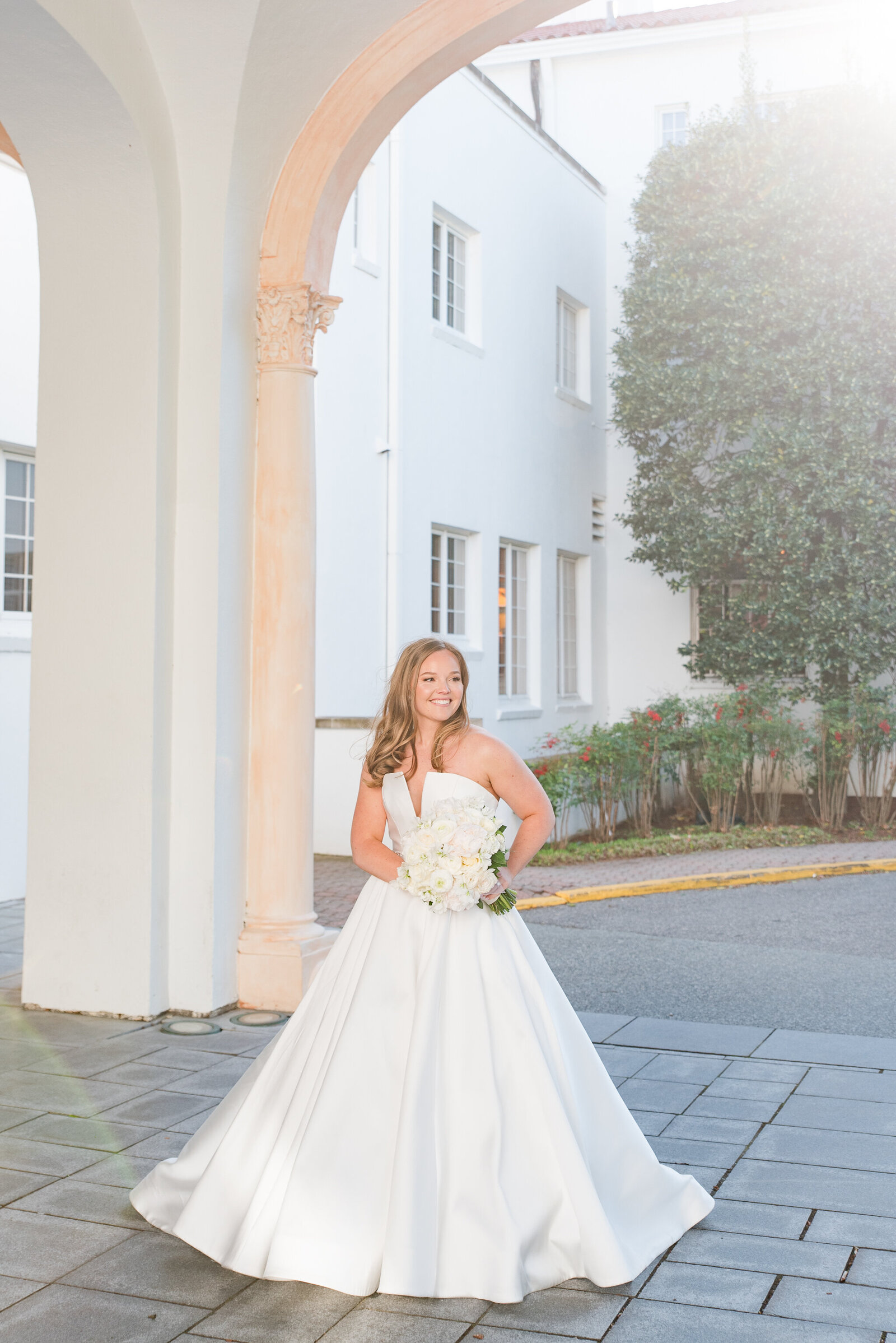 bride on country club holding bouquet