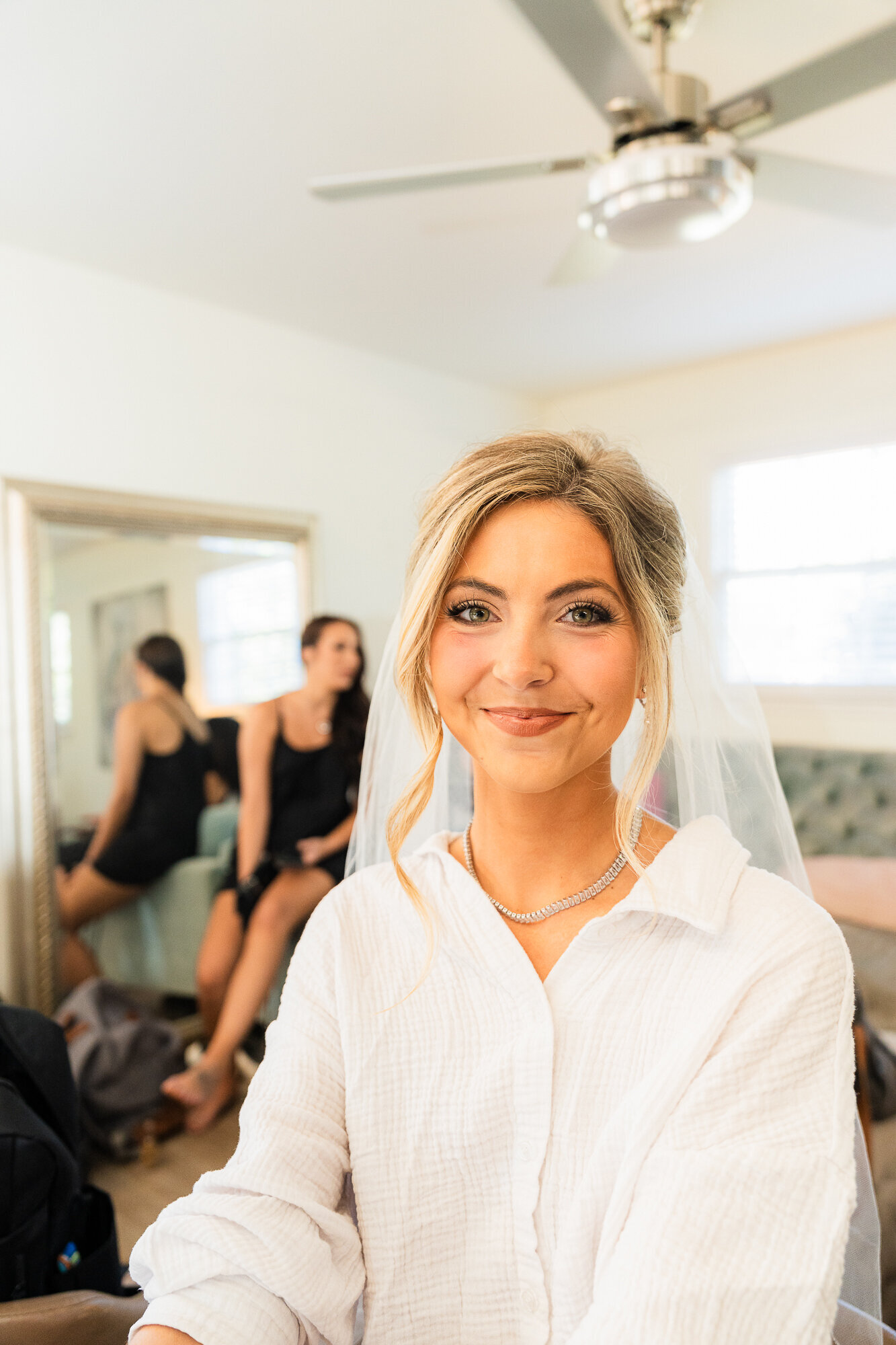 Bride getting ready at the bridal suite at the venue at Daisy Hill