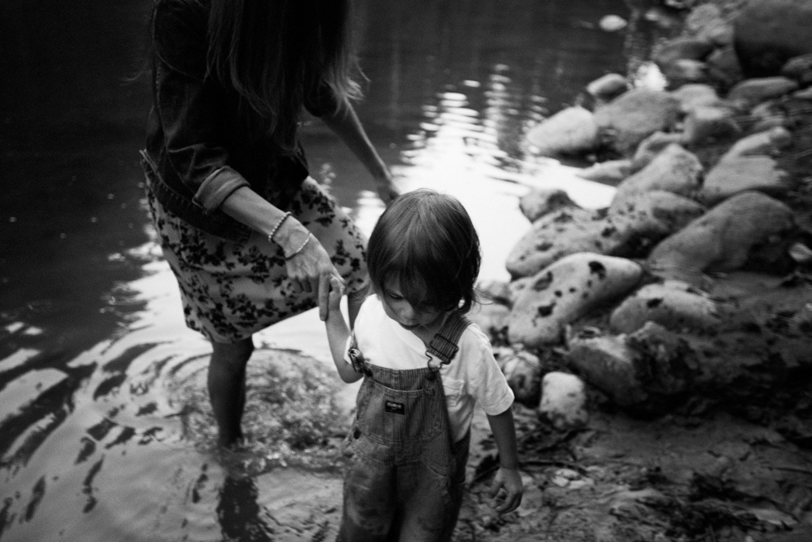 photograph of a little boy leading his mom rooted and wild photography