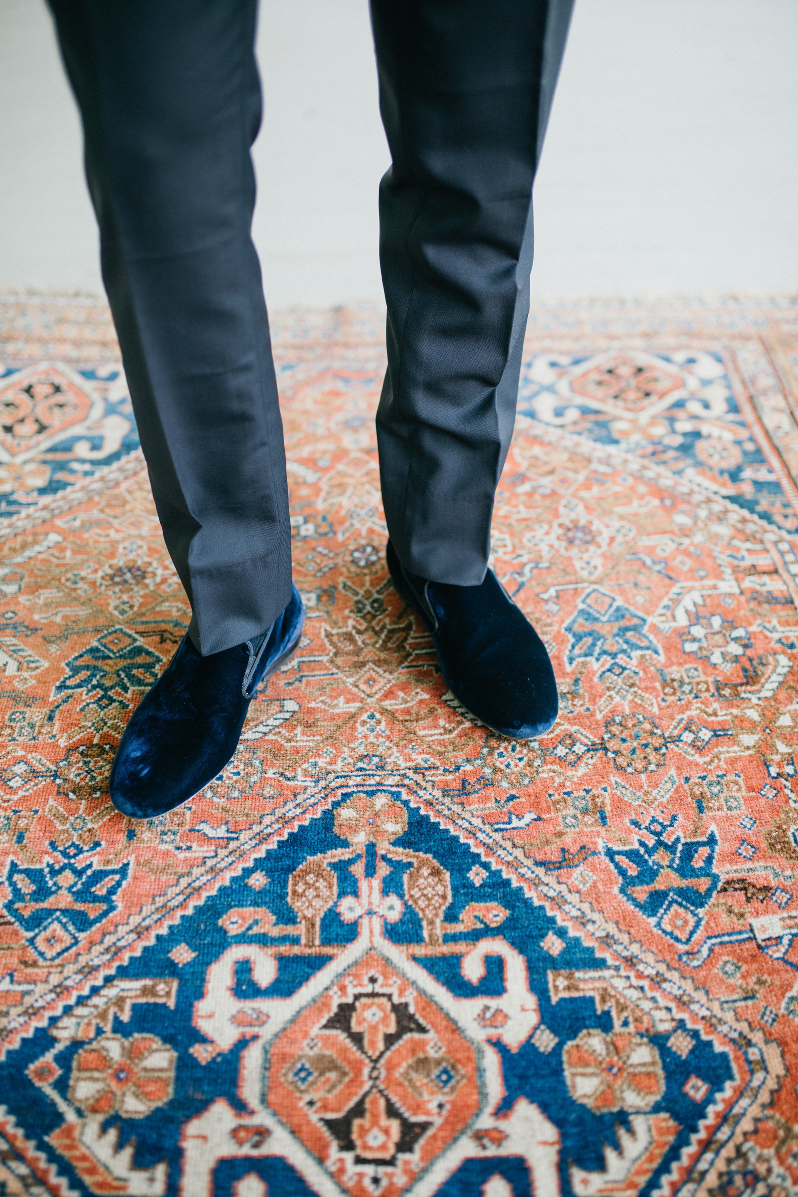 This stylish groom wore blue velvet shoes on his wedding day.