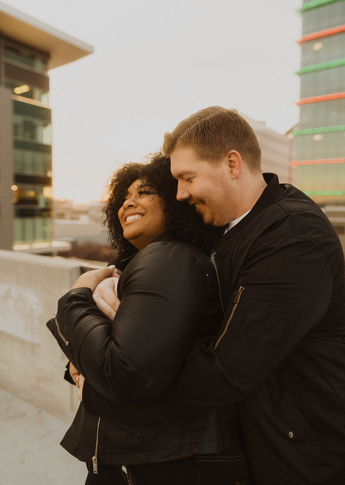boise couples photography cover photo of couple hugging during their downtown boise session