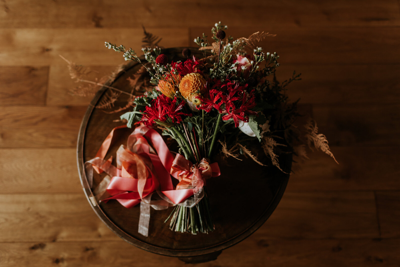 Autumnal Wedding Flower on a round table at London Kew Wedding