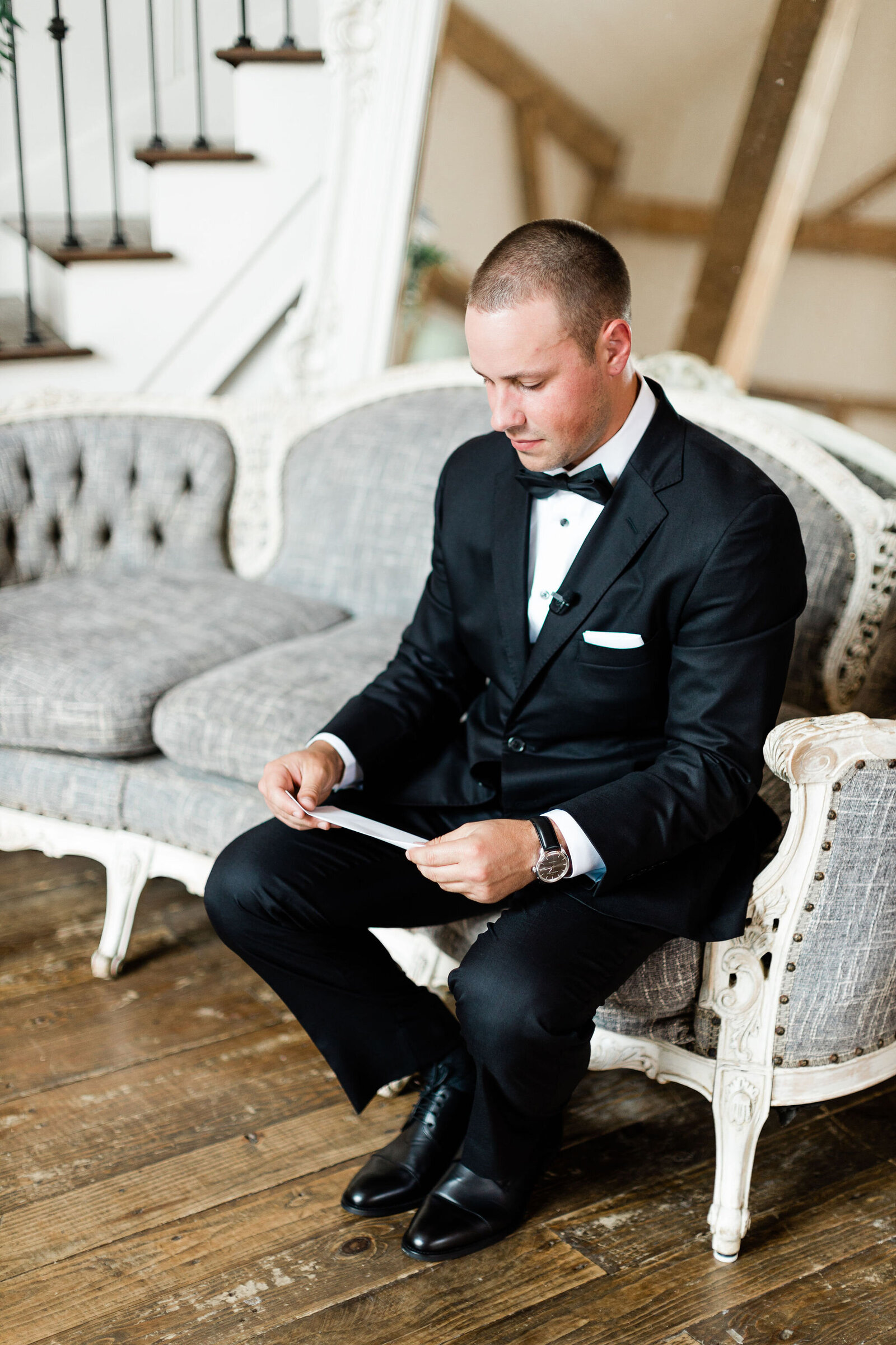 Groom Reading a Letter from his Wife | Cleveland OH | The Axtells Photo and Film